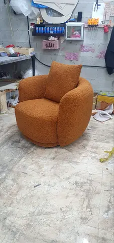 Cozy Orange Bouclé Swivel Armchair