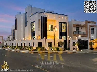 فيلا مودرن زاوية شارعين مع روف وحوش فسيح في الزاهية عجمان | تملك حر 100% بجوار السفير مول 4 غرف ماستر قرب مخرج E311 (أرضي + أول + روف) بموقع استراتي