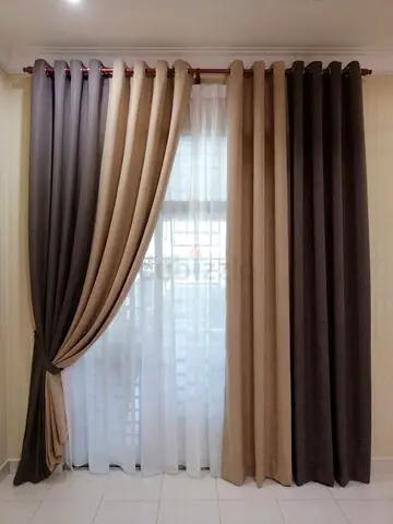 Neutral two-tone blackout curtains with sheer inner panel - set