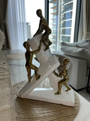Modern Gold & White Abstract Climbing Figures Statue - Decorative Sculpture