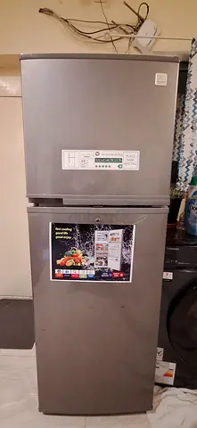 Used double-door refrigerator in good working condition