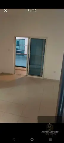 Beautiful 1BR apartment for annual rent in City Tower Ajman. Balcony & parking included. Rent AED 2
