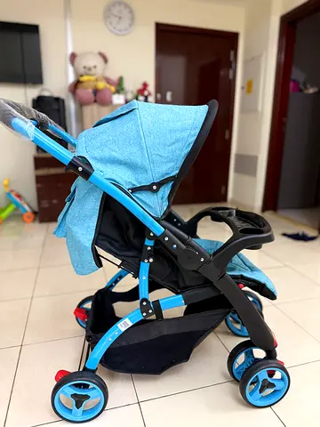 Lightweight Blue Baby Stroller - Good Condition