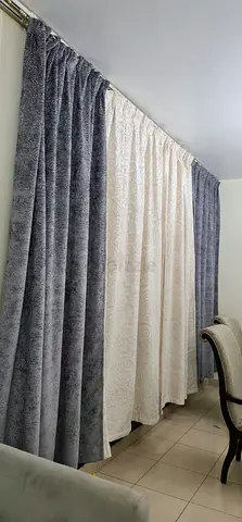 Pair of full-length grey velvet and cream patterned curtains - good condition