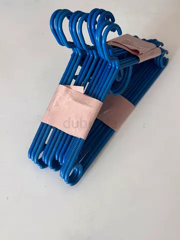 Set of blue plastic clothes hangers - 12 pieces