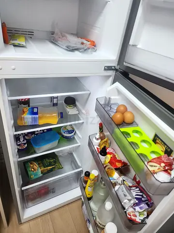 Midea No-Frost two-door refrigerator in good working condition