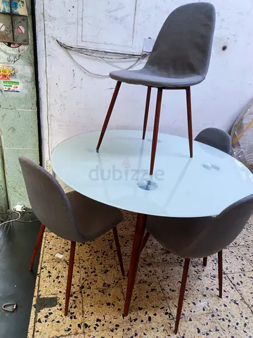 Mid-century Round Glass Dining Table with 4 Grey Fabric Chairs