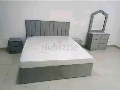 Brand new bed with side table and with dressing table