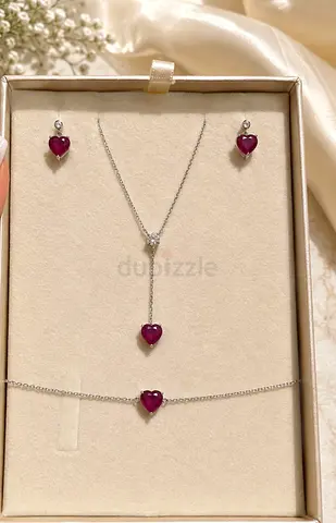 White gold and diamond heart ruby pendant, bracelet and earring set