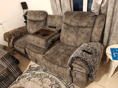 Gray 2-Seater Recliner Sofa with Center Console - Good Condition