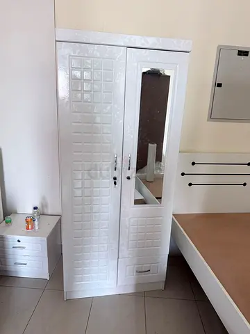 Two door white cabinet available 8pieces for sell