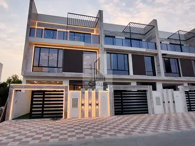 Modern townhouse (ground floor + first floor + roof) for sale in Al Helio Center – Ajman | Includes