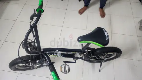Green and Black BMX Bicycle