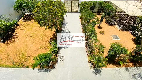 Villa for sale in Al Jazat; prime location and a garden.