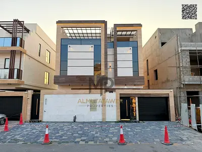 Luxury villa for sale in Al Helio 2 – Ajman, featuring a modern design and high-end finishes. Inclu