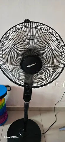 Stand/oscillating fan with remote
