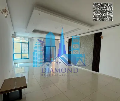 Vacant apartment for sale featuring 3 bedrooms, a living room, and a maid's room, with a view of Ajman Creek, located in Al Khor Towers, Ajman.