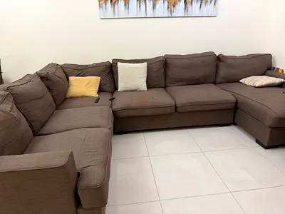 Large L-shaped brown fabric sectional sofa — good condition