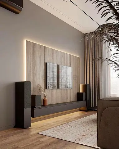 Modern wall-mounted entertainment unit with LED backlit panel and low storage cabinet