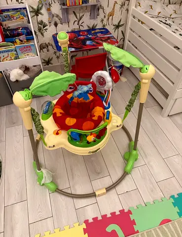 Bright Leaf-themed Baby Jumper/Activity Center - Good Condition