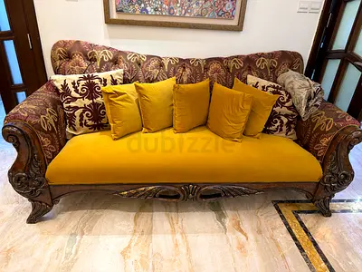 Antique-style mustard velvet accent armchair with carved wooden frame