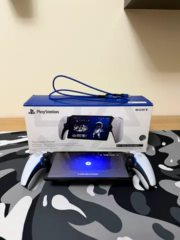 PlayStation Portal Remote Player for PS5 + Box + Charger - New & Perfect Condition.