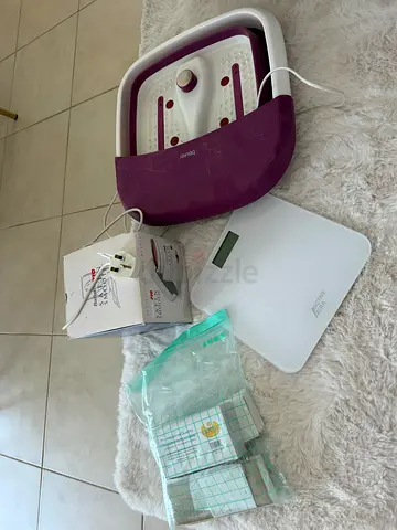 Foot spa scales wax pot and spatulas and paper