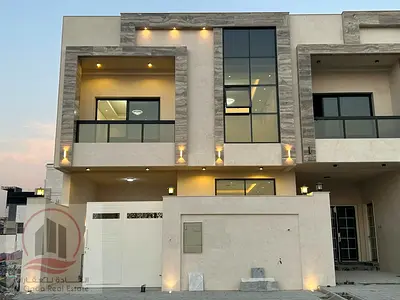 For sale, a villa in Ajman Al Helio, 5 master rooms, a Majles room, a hall, and a maid’s room, free