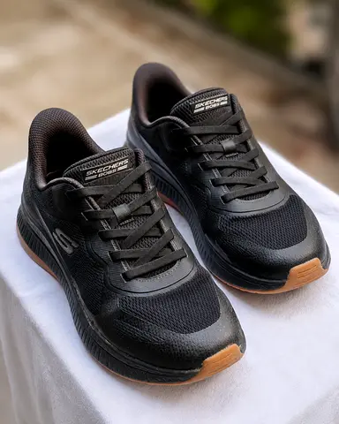 Skechers black men's running shoes, lightly used. As good as New