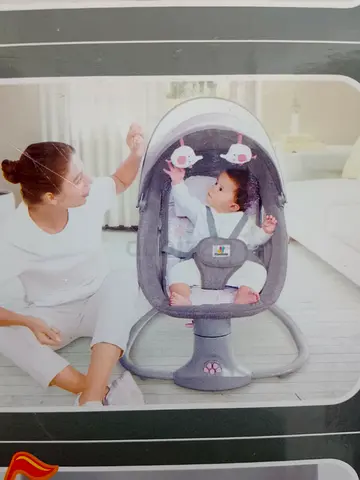 Baby rocker / swing chair with toy bar - gently used