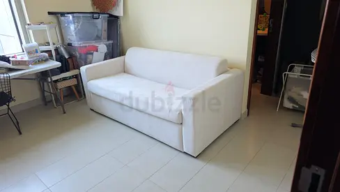 Italian comodo two seater sofa bed with mattress