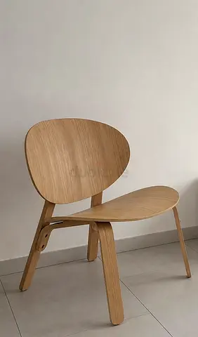 Light oak wooden lounge chair