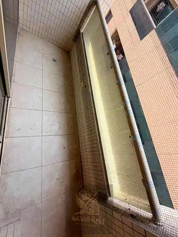 Annual rental in Al Qulaya, one bedroom apartment with two bathrooms, balcony and built in wardrobes, rent 30000, payment in 4 or 6 cheques, deposit 2