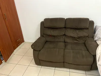 2-seater Allecia reclining loveseat in brown - used, good condition