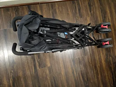 Lightweight foldable twin stroller with umbrella mother care - good condition