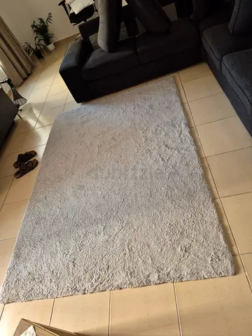 Light grey shaggy rug - soft, used, good condition (approx 160x230cm)