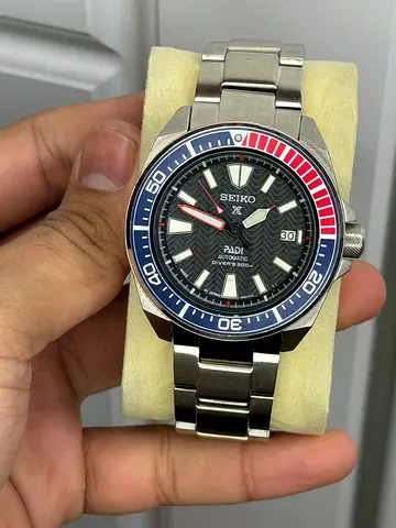 Seiko Prospex PADI Samurai (SRPB99), featuring a distinctive textured black dial,
