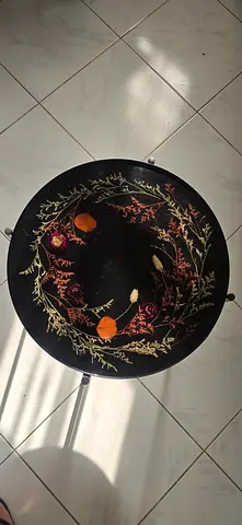 Simple round black metal side table. Handmade epoxy resin with flowers top.