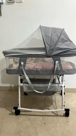 Portable Baby Bassinet with Canopy and Storage Basket