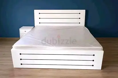Good quality bed with side table and with mattress brand new condition