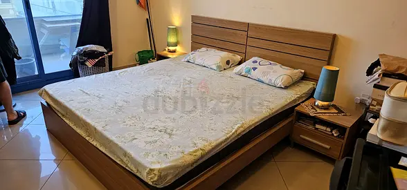 King wooden bed frame with mattress and bedside tables - good condition