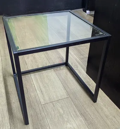 Simple black metal coffee table with glass top free delivery Inside Abu Dhabi city