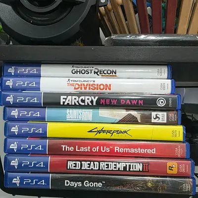 Ps4 with one controller and 8 games
