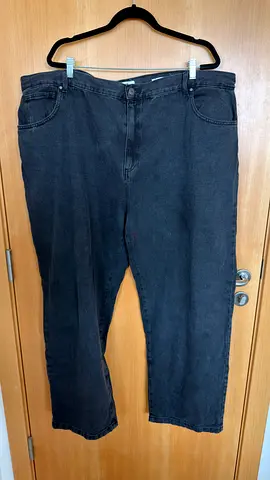 Woman’s black denim jeans, size approx XL, gently used