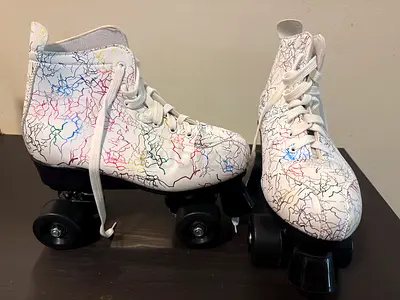 4-wheel roller skates + safety padding for quick sale!