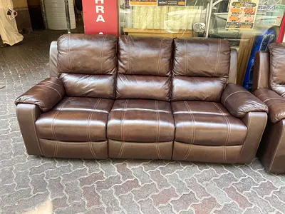 Brown leather 3+2 seater recliner sofa in good condition