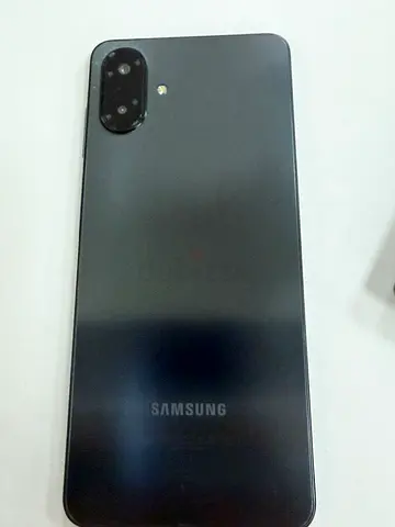 Samsung smartphone (black) - good condition, rear view shown