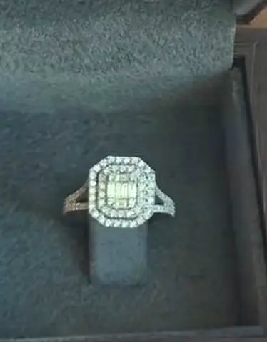 Elegant diamond halo cocktail ring in white gold (size not specified)