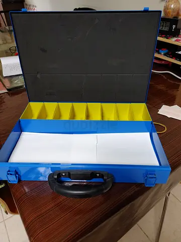 Blue plastic toolbox / organizer with removable dividers, used