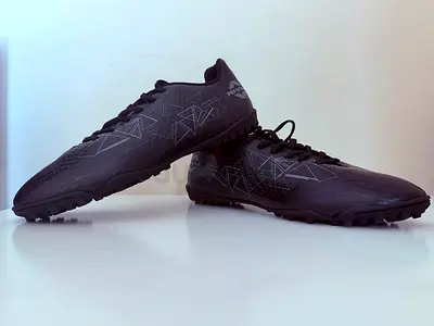 Nivia carbonite football turf shoes